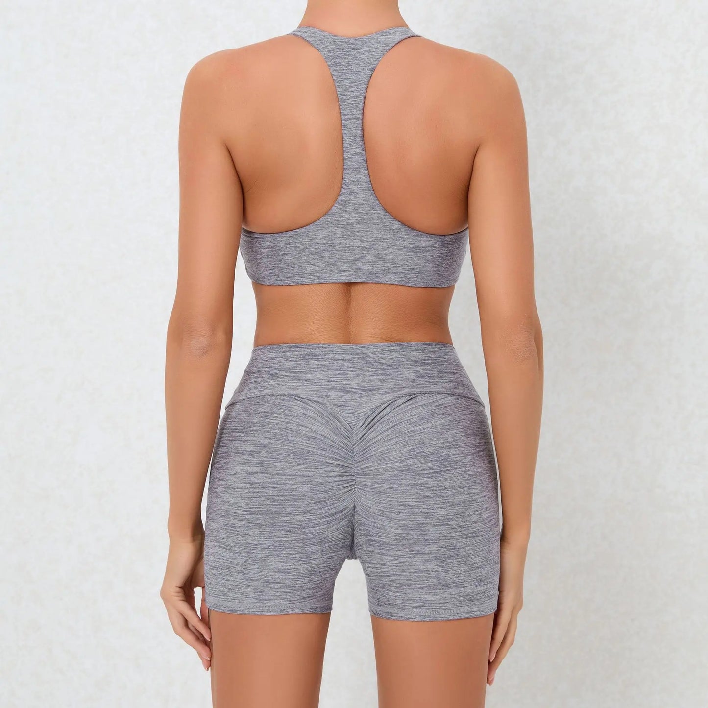2 PIECE GYM SET WITH LACE UP BRA AND V-SHAPED SHORTS